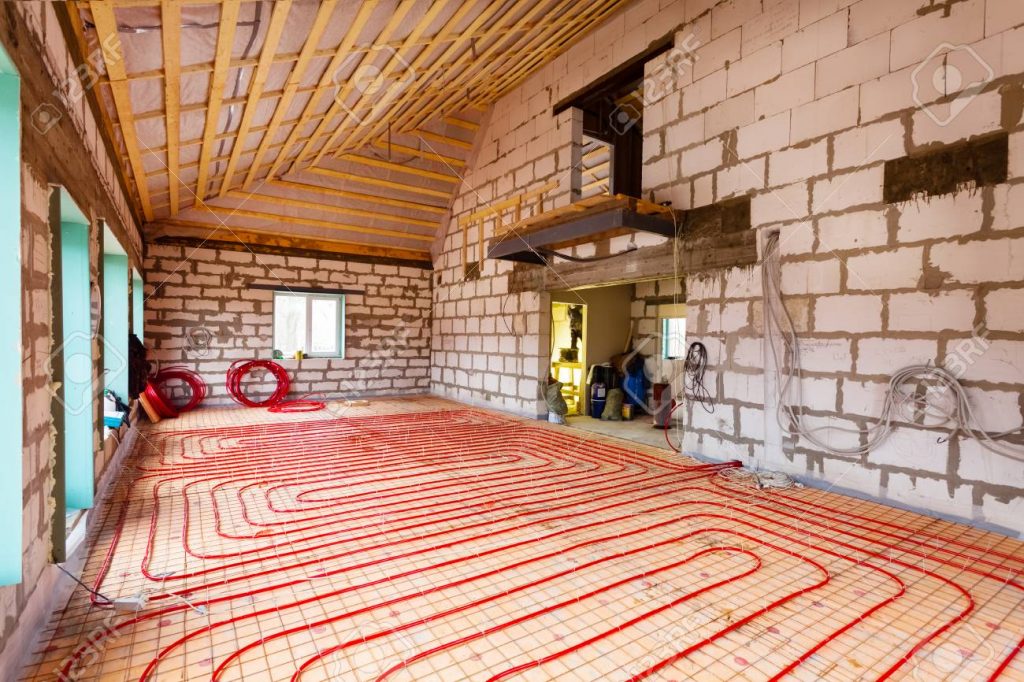 97995627-pipefitter-installing-system-of-heating-or-underfloor-heating-installation-water-floor-heating-syste
